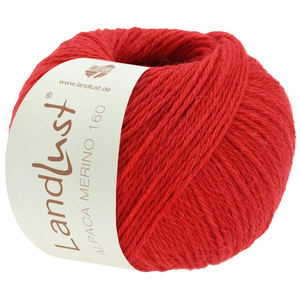 A ball of red yarn with a label.
