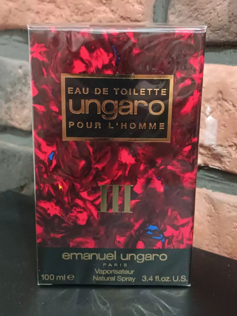 A product box for perfume, with a textured background.