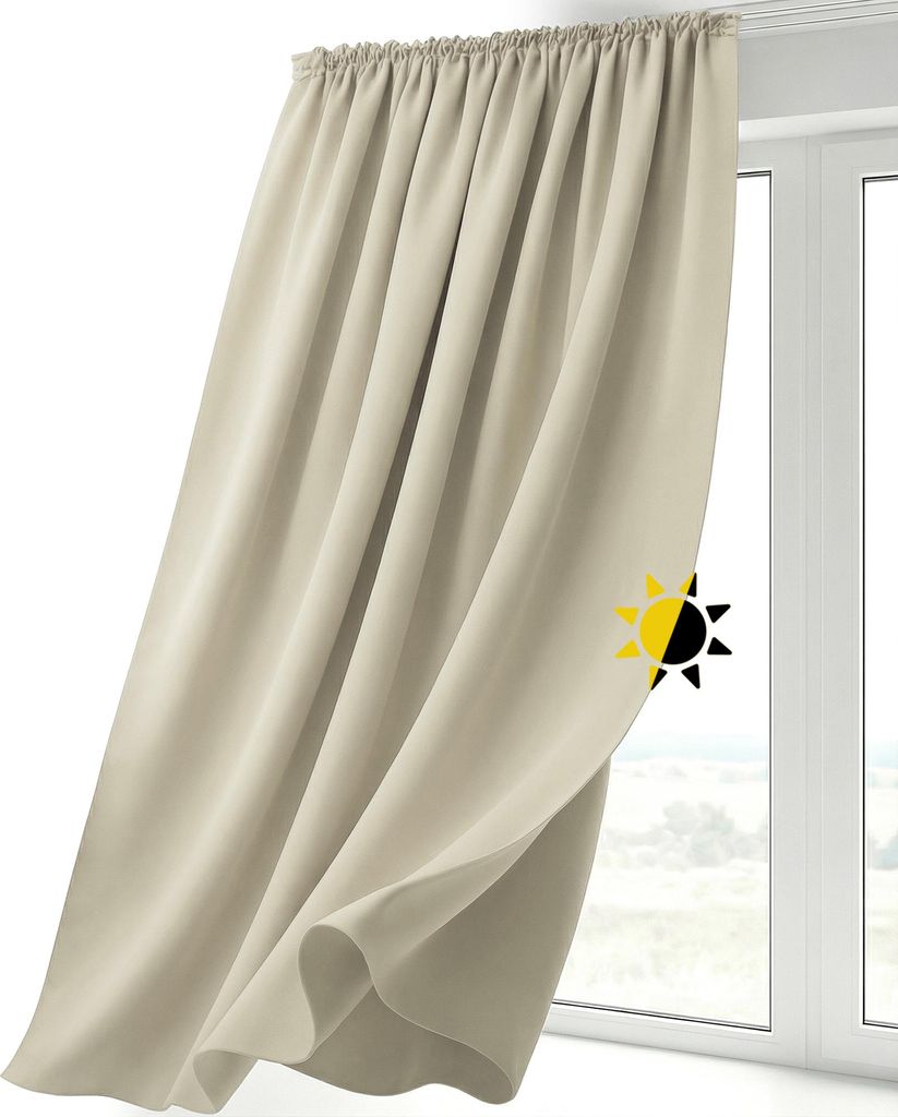A beige curtain hanging in front of a window.