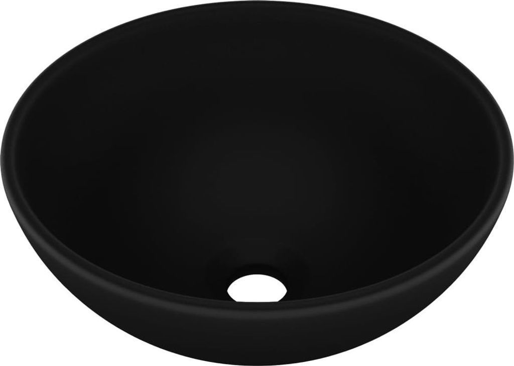 A black ceramic sink with a drain hole in the center.