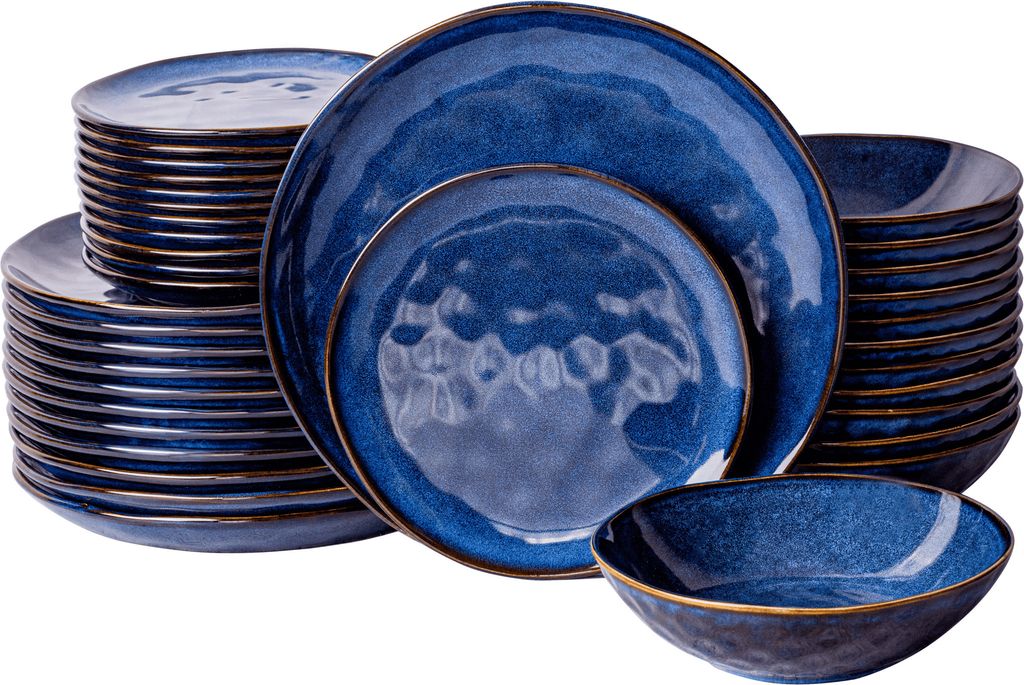 A stack of blue ceramic plates and bowls with gold trim, arranged on a white background.
