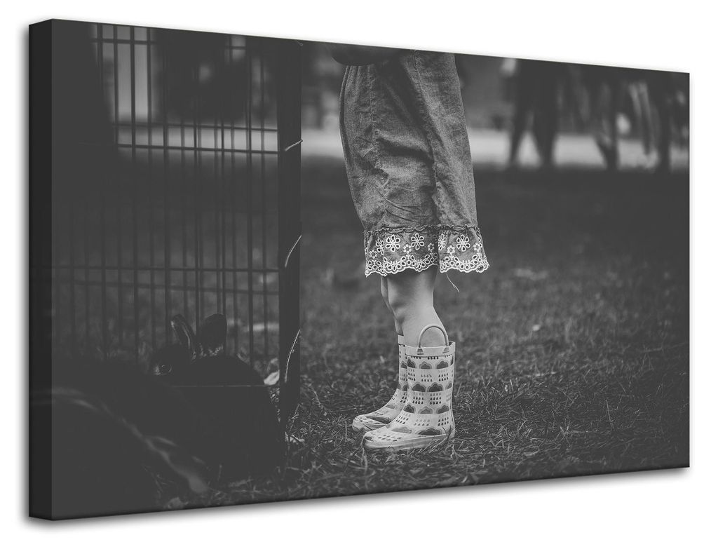 Leinwanddruck: Schwarze und weiße Gummistiefel, 80 x 50 cm