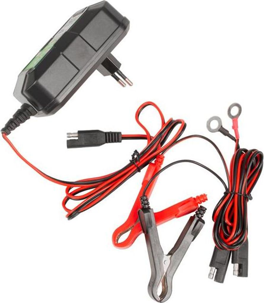 A battery charger with various cables and connectors is laid out on a white background.