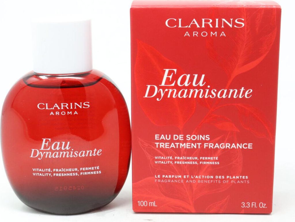 A bottle of Clarins Eau Dynamisante fragrance and its packaging are displayed side-by-side against a white background.
