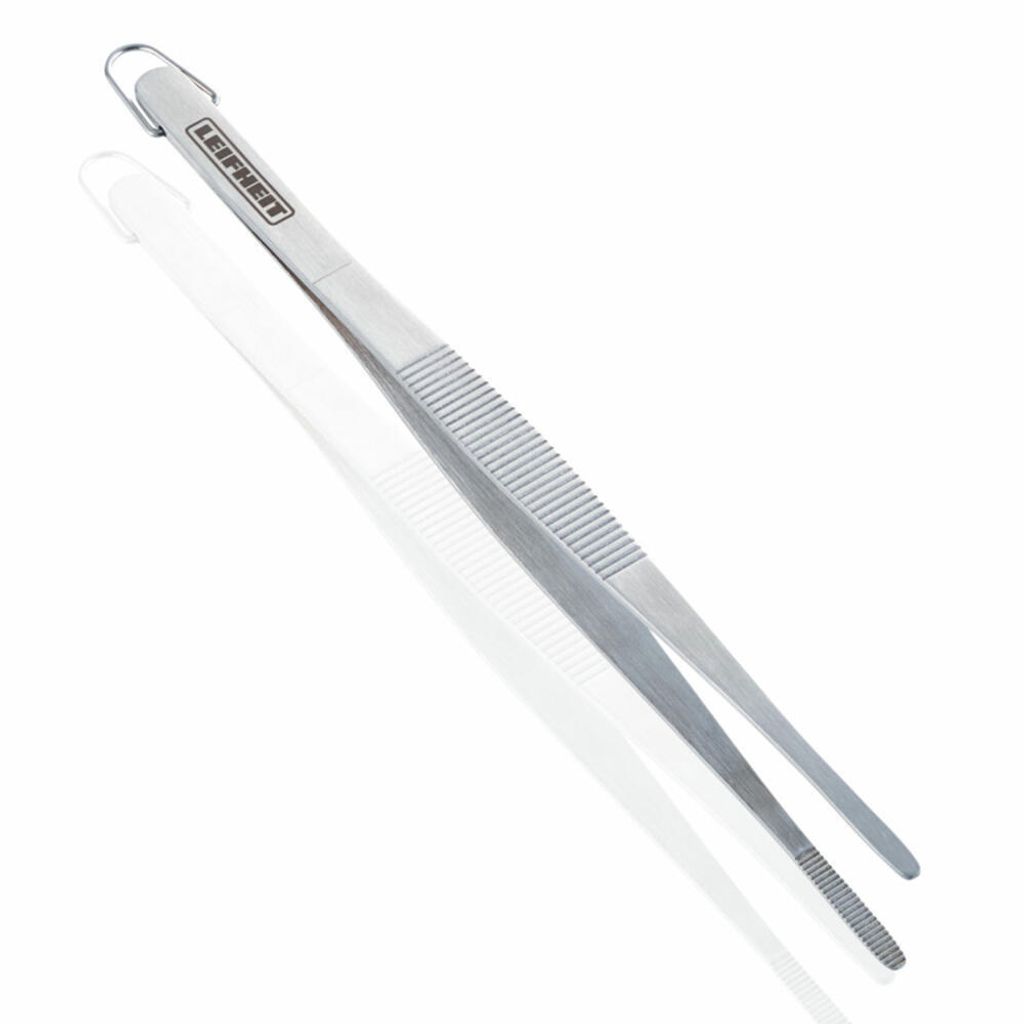 A stainless steel kitchen tweezer is shown on a white background with its reflection.
