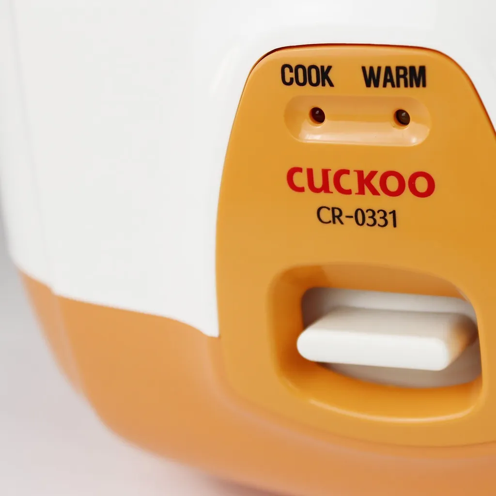 Cuiseur à riz électrique compact Cuckoo CR-0331 de 0,54L blanc et orange - 12