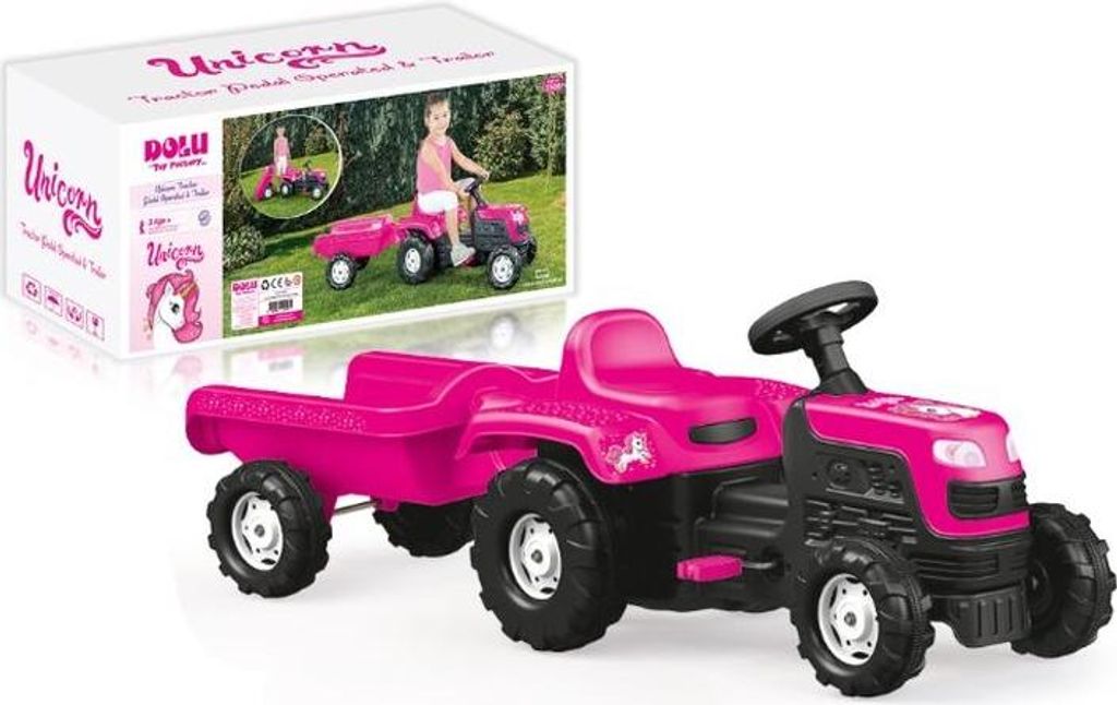 A pink toy tractor with a trailer, shown next to its packaging.