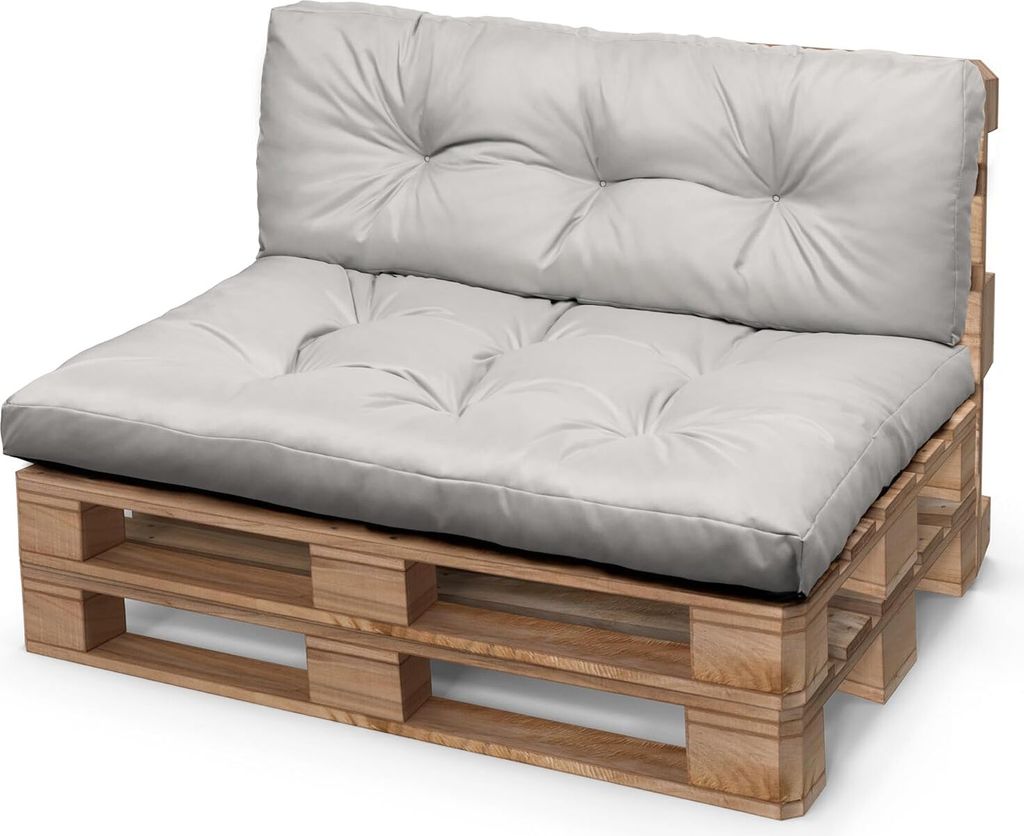 A gray pallet cushion set on a wooden pallet.