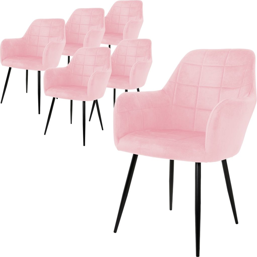 A set of pink dining chairs with black legs.