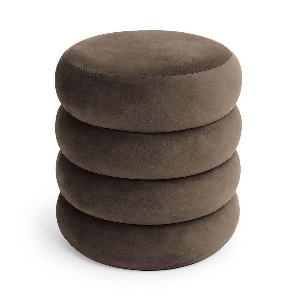 A stack of four round, upholstered ottomans.