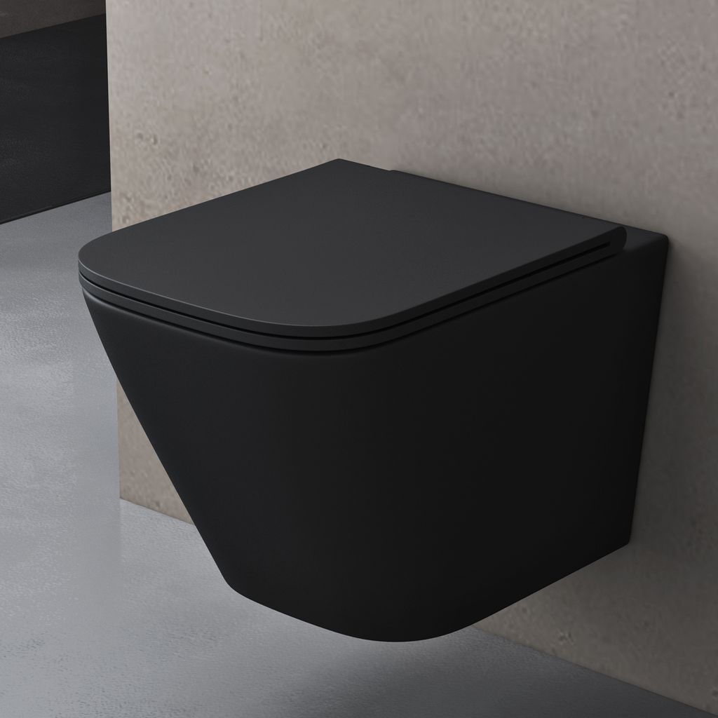 A black wall-mounted toilet is shown against a concrete wall and floor.