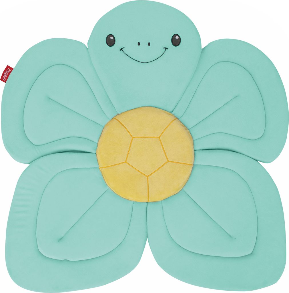 A teal and yellow flower-shaped bath pillow with a smiling turtle face.