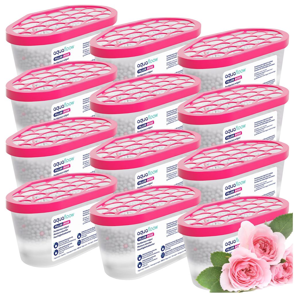 A collection of moisture absorbers with pink lids and a bouquet of pink roses.