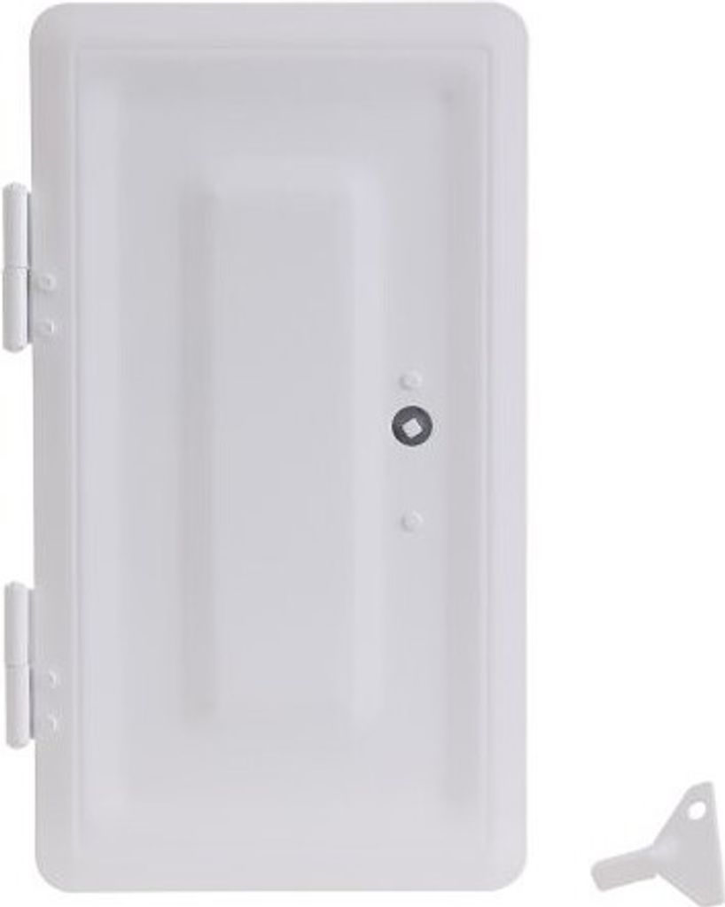 A white painted chimney door with a key.