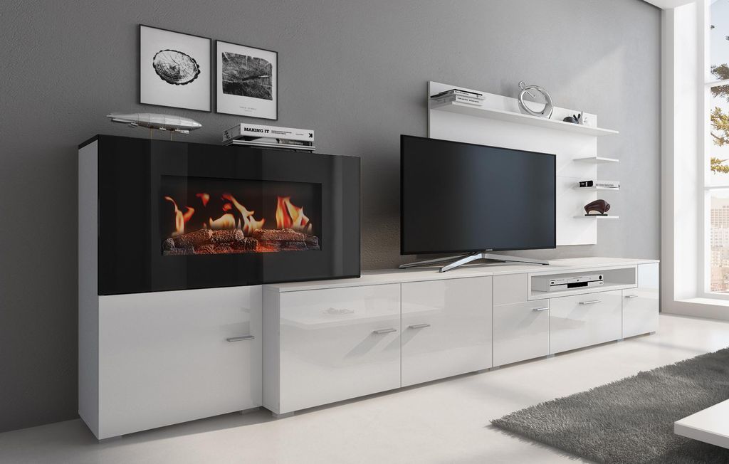 A modern living room entertainment unit with a built-in electric fireplace and a television.