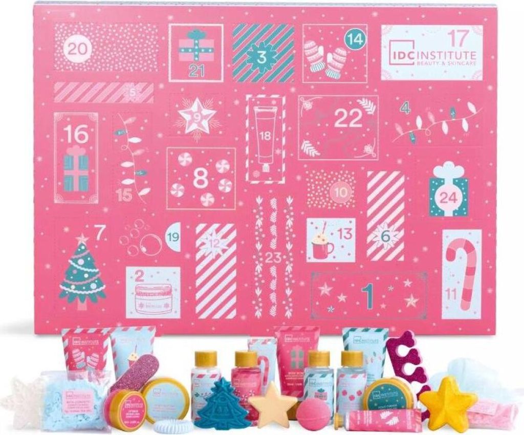 A pink advent calendar with numbered doors and various festive illustrations, with some of the advent calendar's contents displayed in front of it.