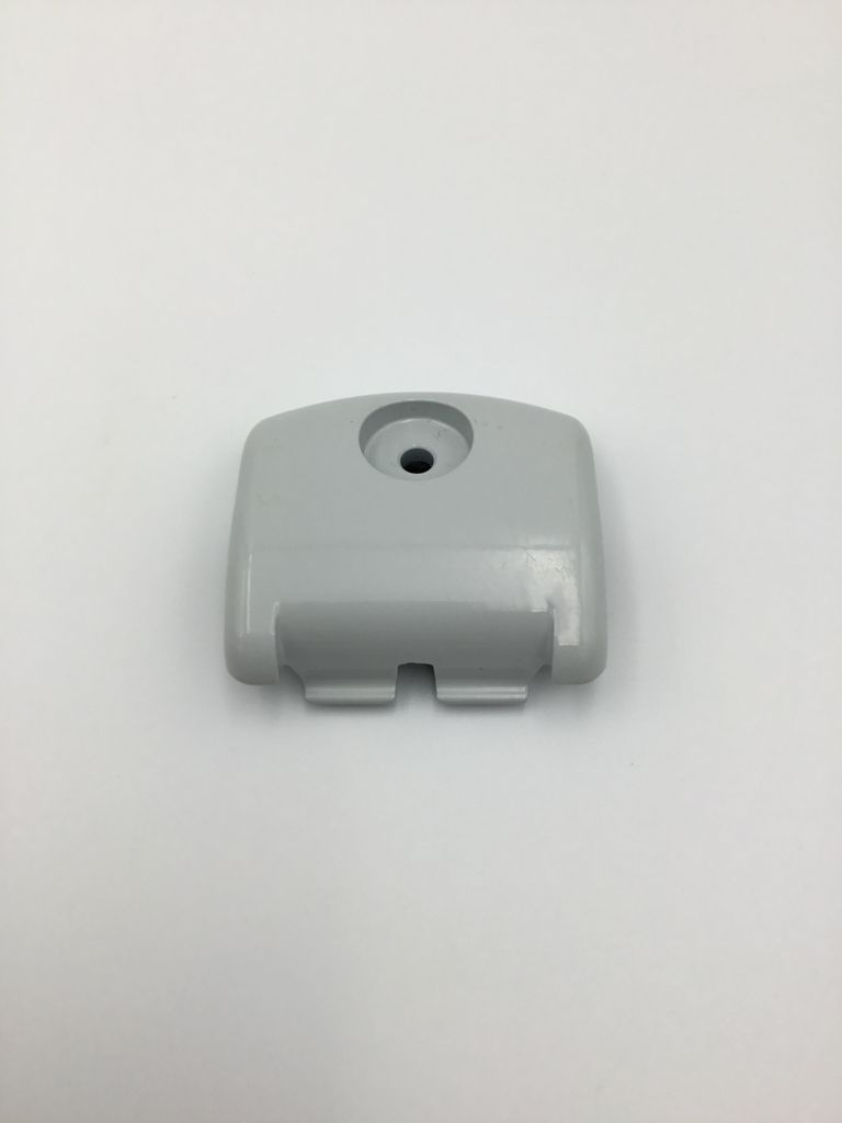 A light gray plastic part with a hole in the center and two slots at the bottom, set against a white background.