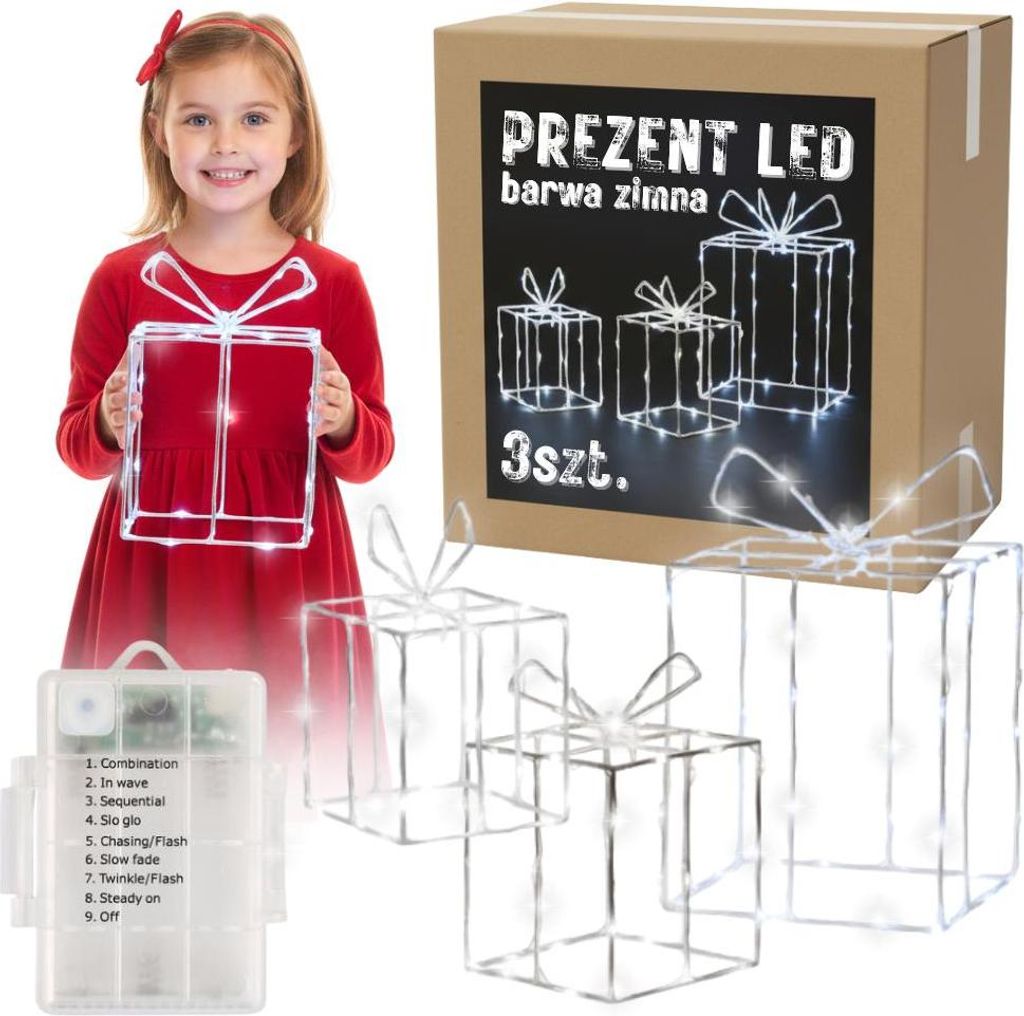 A young girl holds a lit gift box decoration while a set of three lit gift box decorations and a product box are displayed.