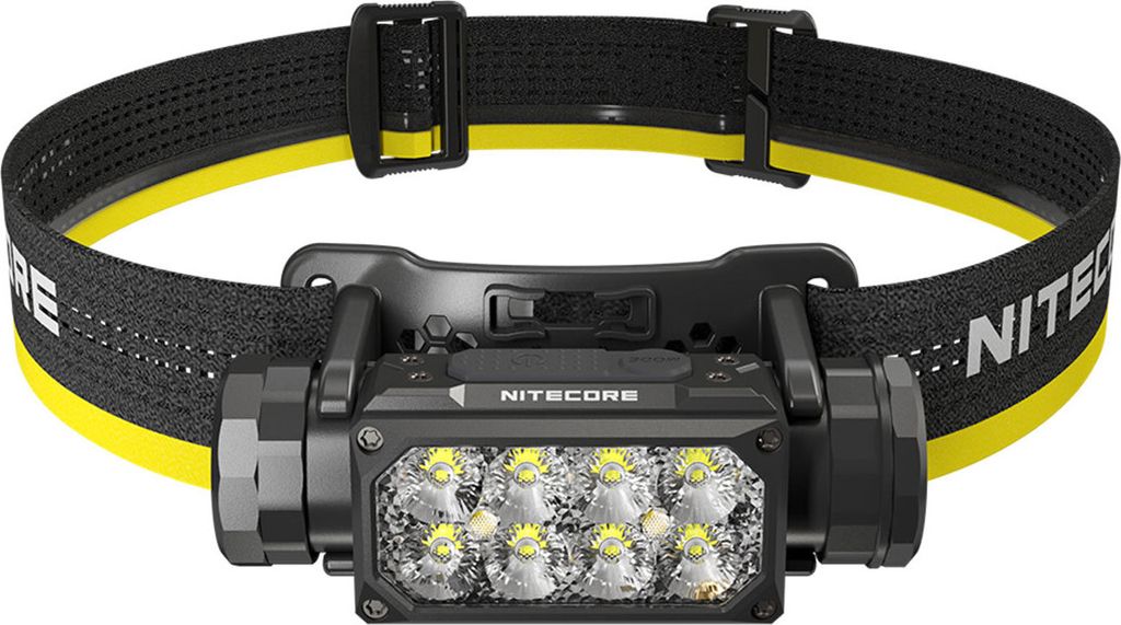 A black Nitecore headlamp with a yellow and black strap is shown against a white background.