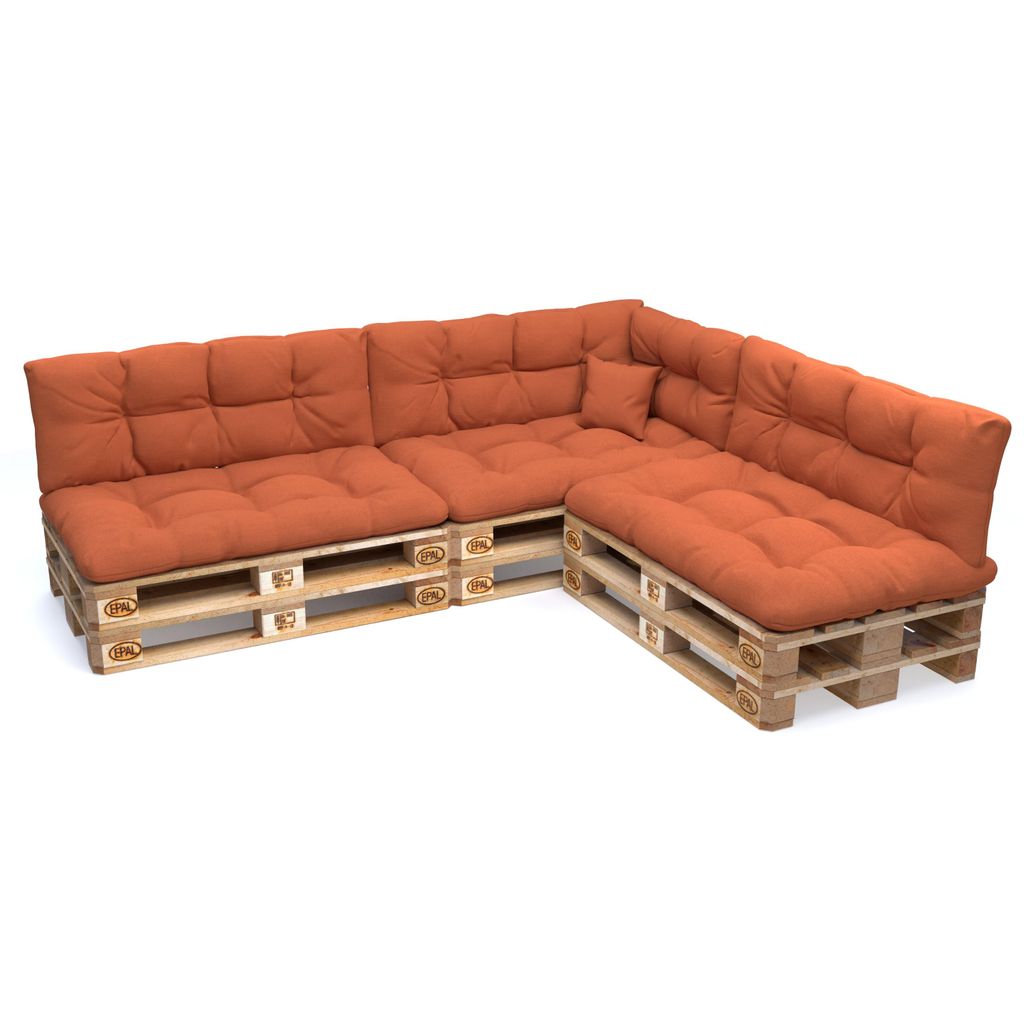 A sectional sofa made from wooden pallets with orange cushions, shown against a white background.