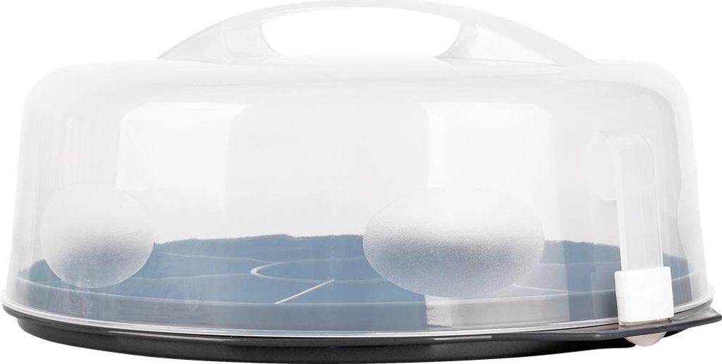 A cake carrier with a clear lid and a black base, containing two white spheres on a blue insert.