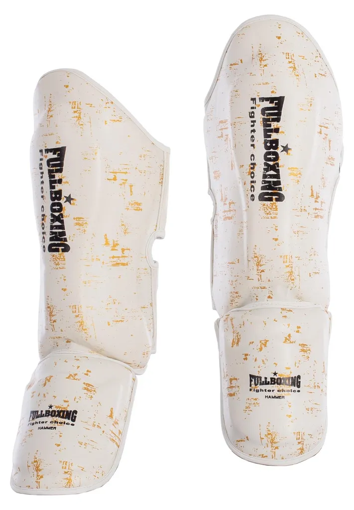 Protège-tibias blancs Hammer Fullboxing pour éviter les chocs de boxe