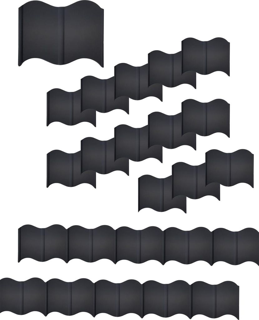 Multiple black garden edging pieces arranged in a wavy pattern.