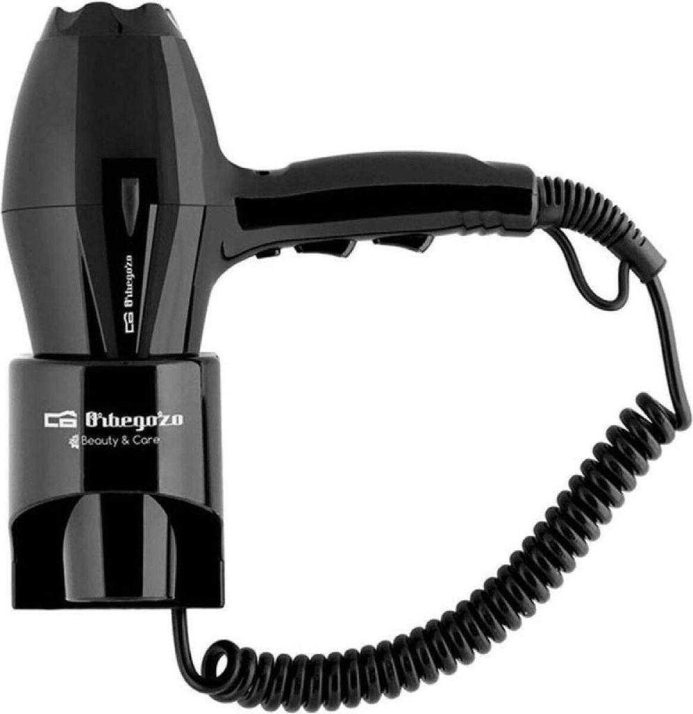 A black Orbegozo SEH 1850 hair dryer with a coiled cord is shown against a white background.