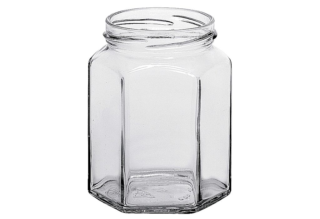 A clear, studio shot of an empty, hexagonal glass jar against a white background.