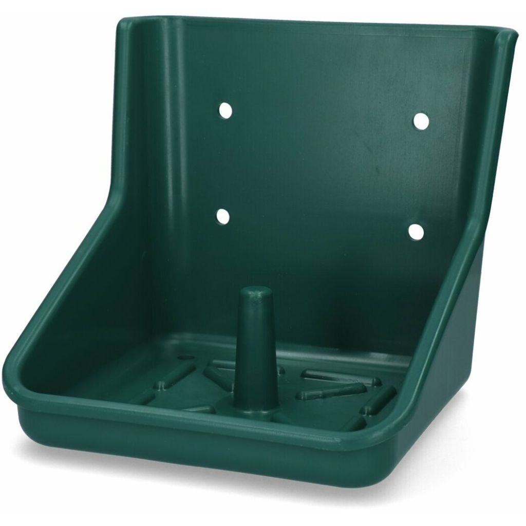 A green plastic holder for a lick stone, designed to be mounted on a wall.