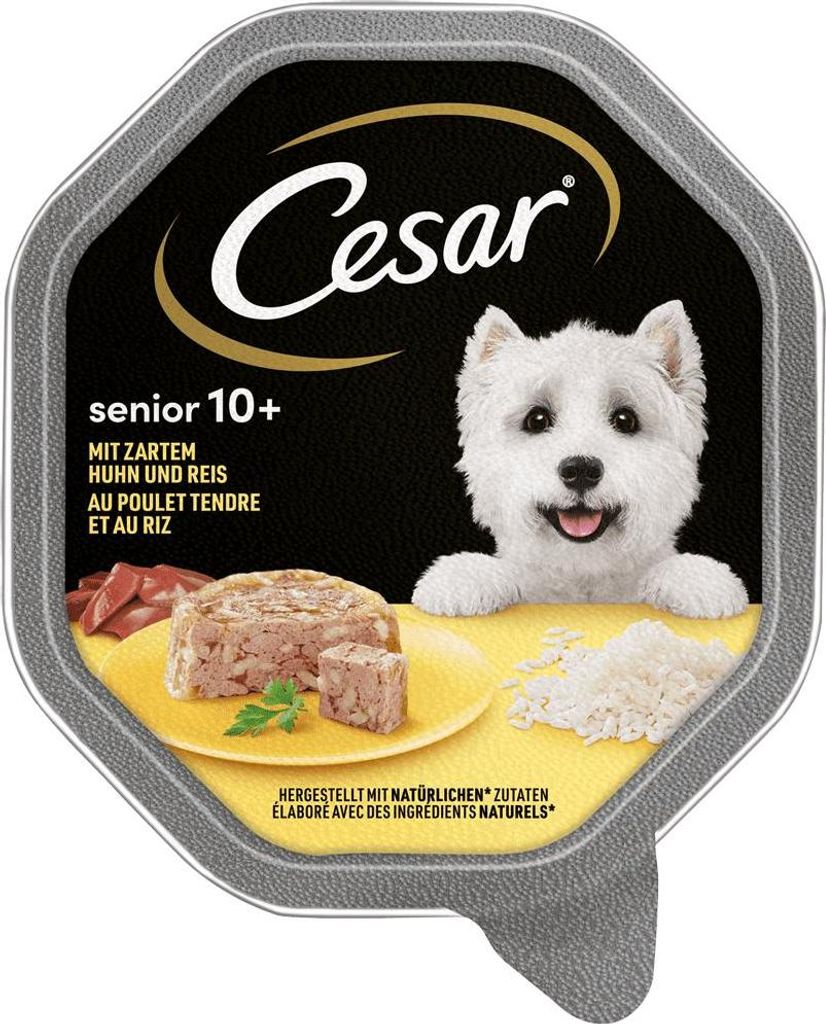 A close-up of a dog food container lid, showing the brand logo, product details, and an image of dog food with rice.
