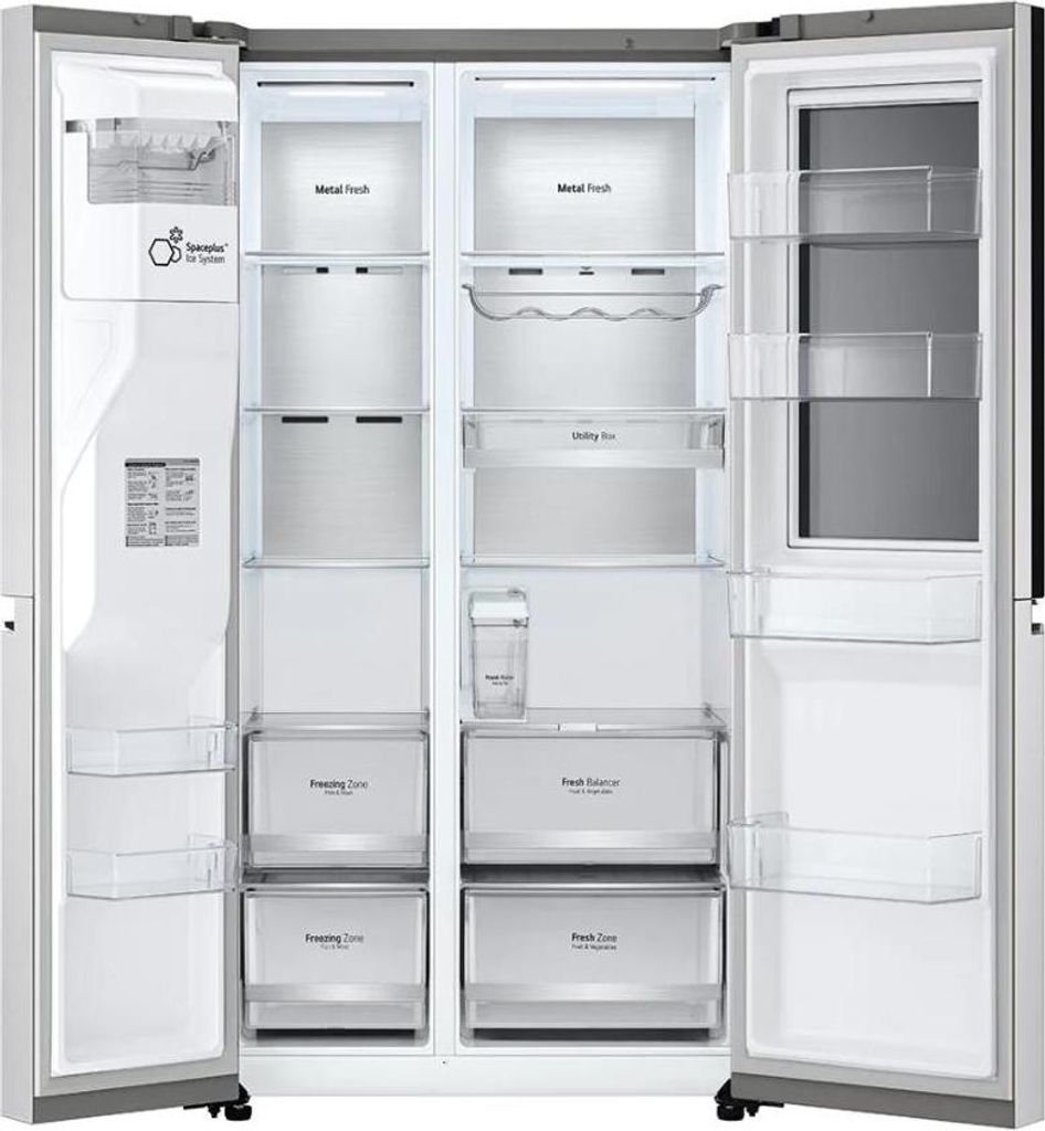 The interior of an open LG refrigerator and freezer combination.