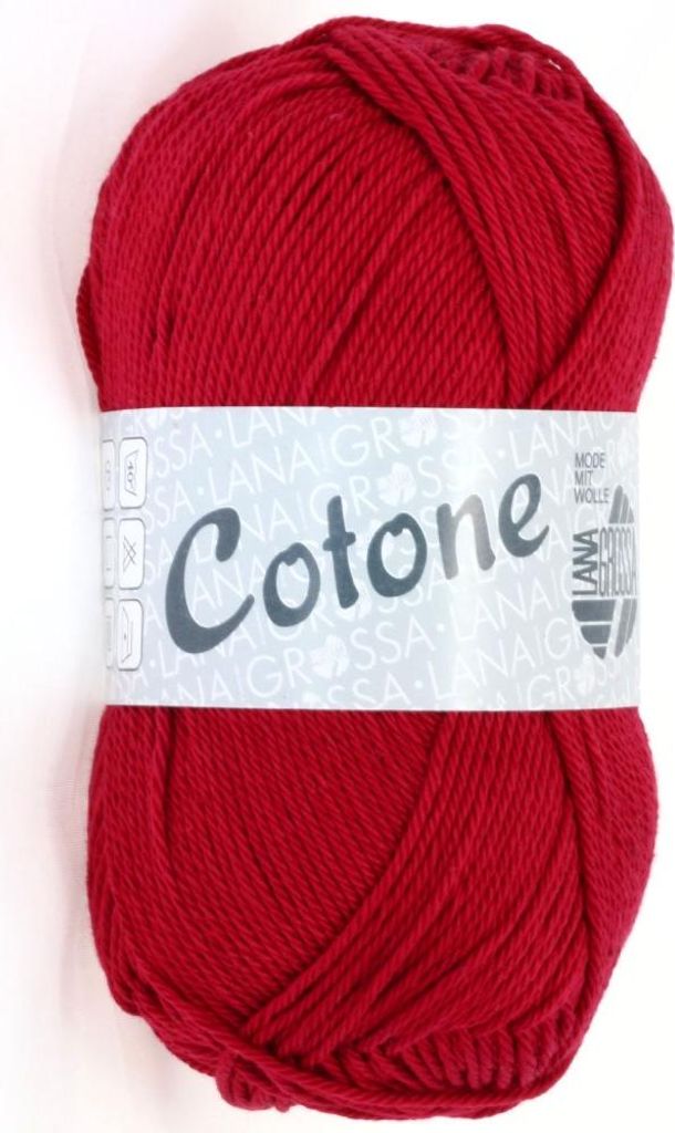 A ball of red yarn with a label.