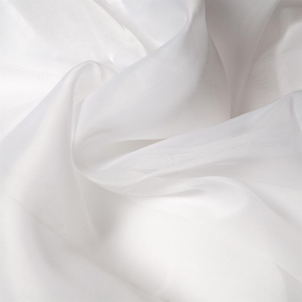 A close-up, abstract view of white, sheer fabric with soft folds and highlights.