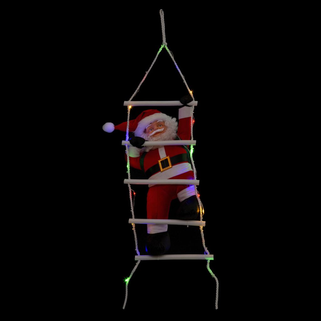 A Santa Claus figure climbing a ladder decorated with colorful lights against a black background.