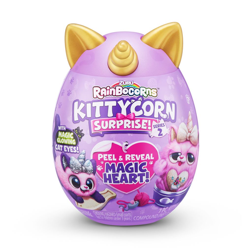 A purple egg-shaped toy with cat ears and a unicorn horn, featuring images of pink plush kittens and text.