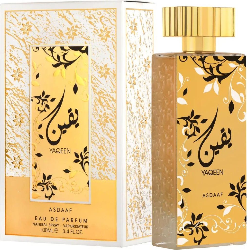 A perfume bottle and its packaging are displayed against a white background.