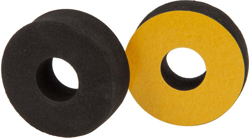 Two circular foam gaskets, one black and one black with a yellow adhesive backing, are shown against a white background.
