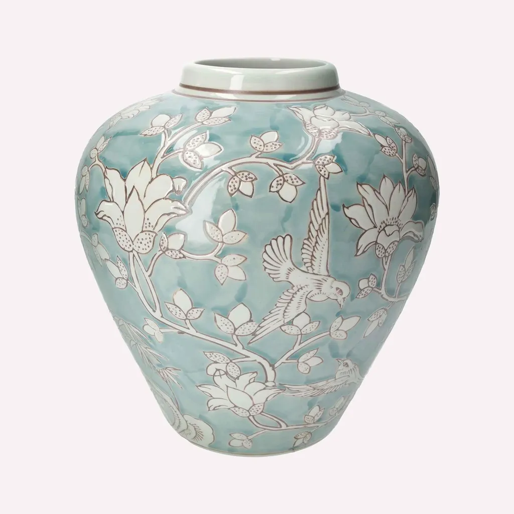 Vase décoratif en porcelaine vert d'eau et motifs arabesques blanches