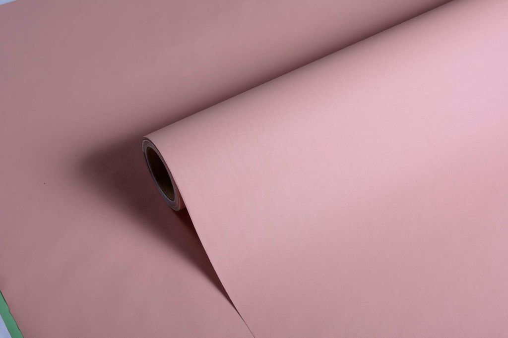 A roll of pink paper unfurling.