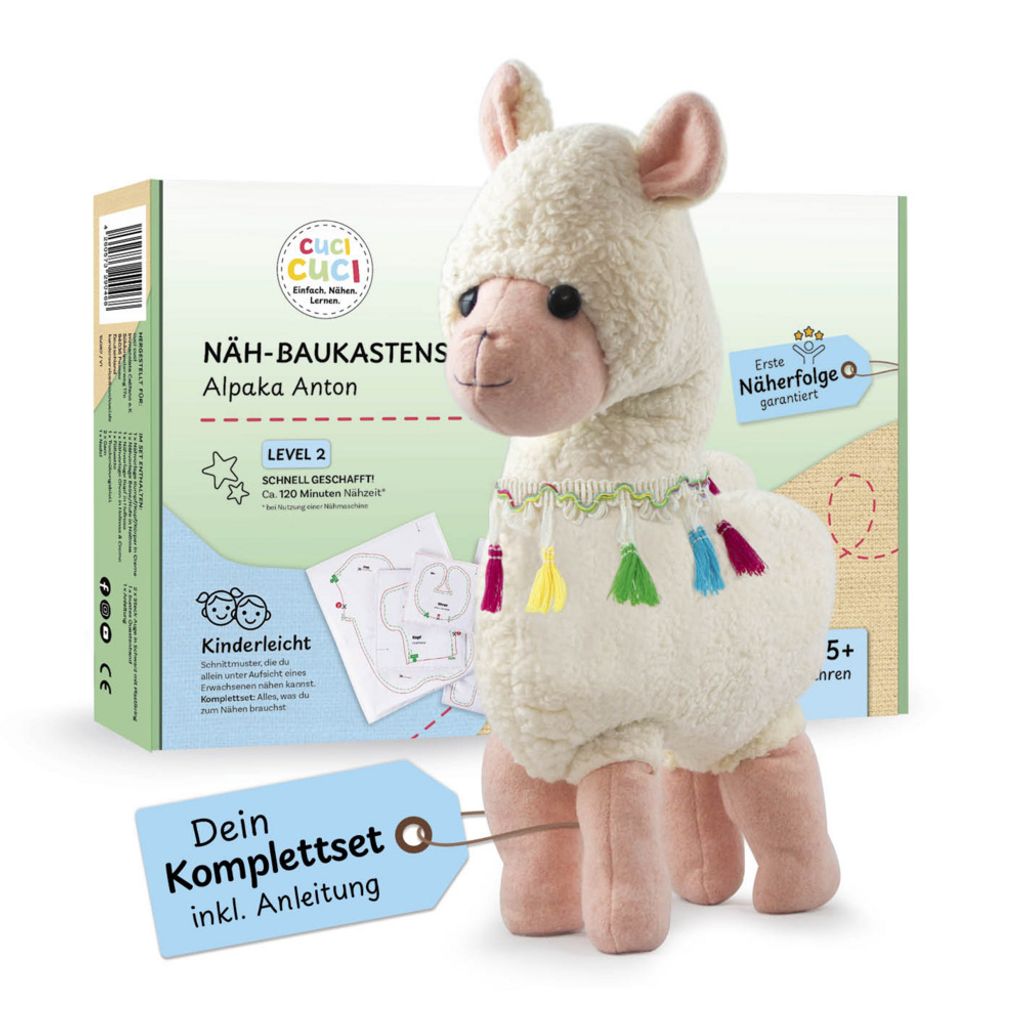 A sewing kit for making an alpaca plush toy, with the finished toy prominently displayed next to its packaging.
