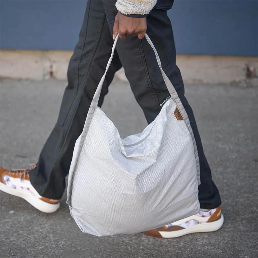 Ne manquez plus de place avec le Packable Tote 12L Peak Design Raw robuste - 9
