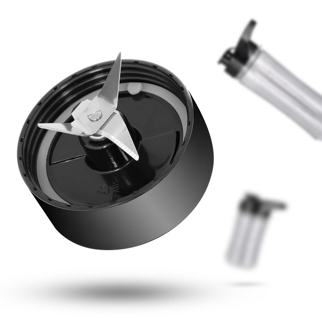 A close-up of a blender blade attachment with two blurred smoothie bottles in the background.