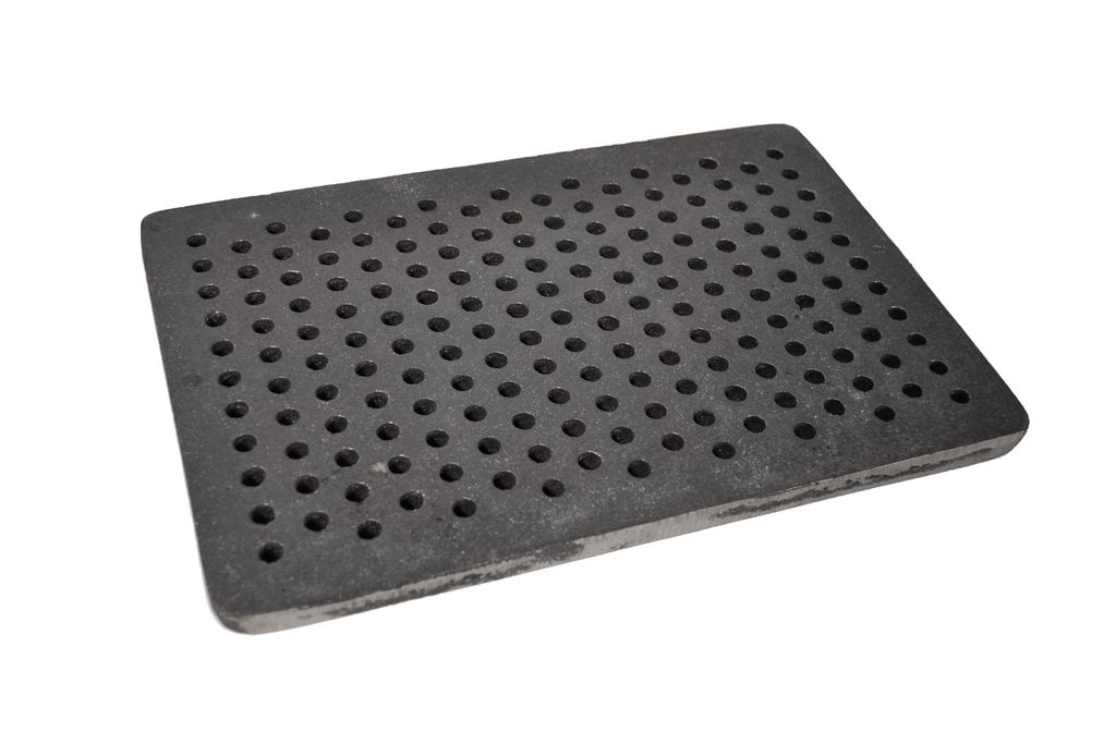A rectangular grate with many small holes, likely for a stove or oven, is shown against a white background.