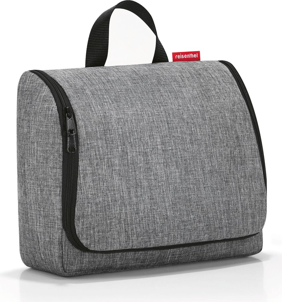 A grey toiletry bag with a black handle and zipper, against a white background.