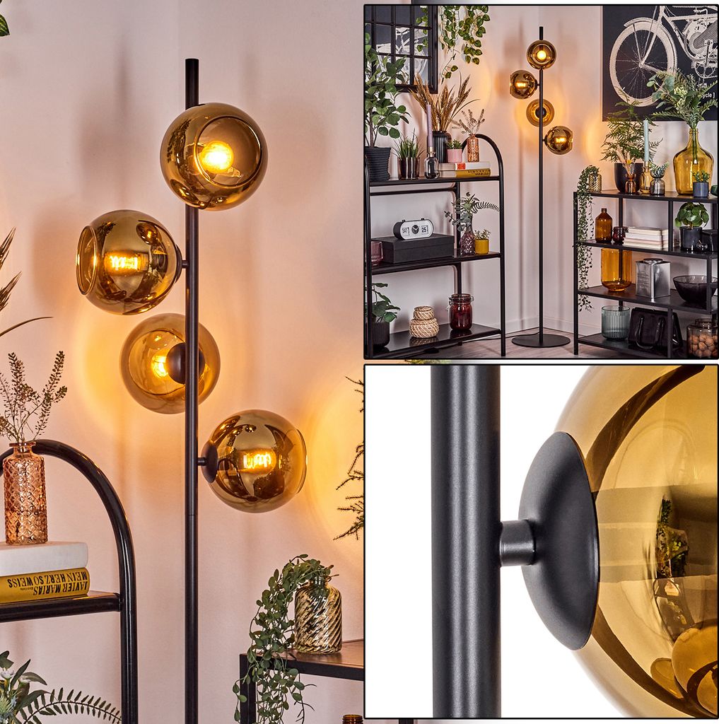 Cesaro Stehlampe aus Metall/Glas in Schwarz/Goldfarben mit Fußschalter