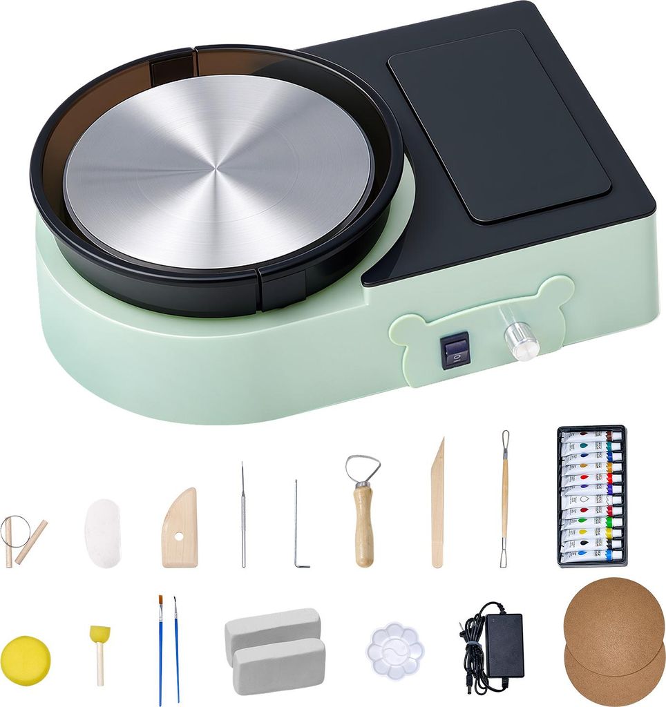 A pottery wheel machine and a set of pottery tools are displayed against a white background.