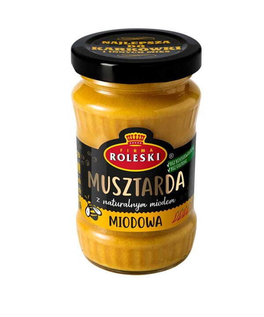 A jar of mustard on a white background.