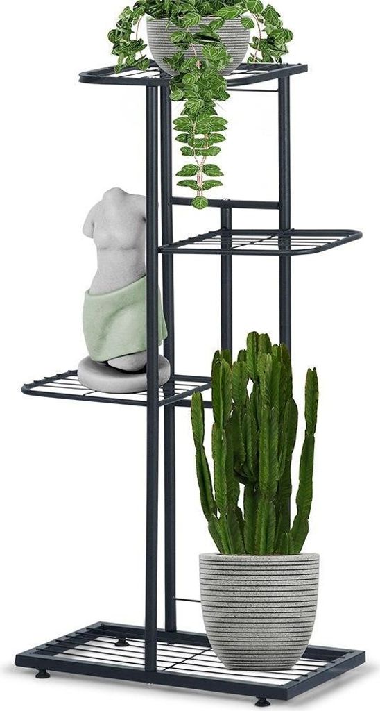 A black metal plant stand with four tiers, holding three potted plants and a decorative bust.