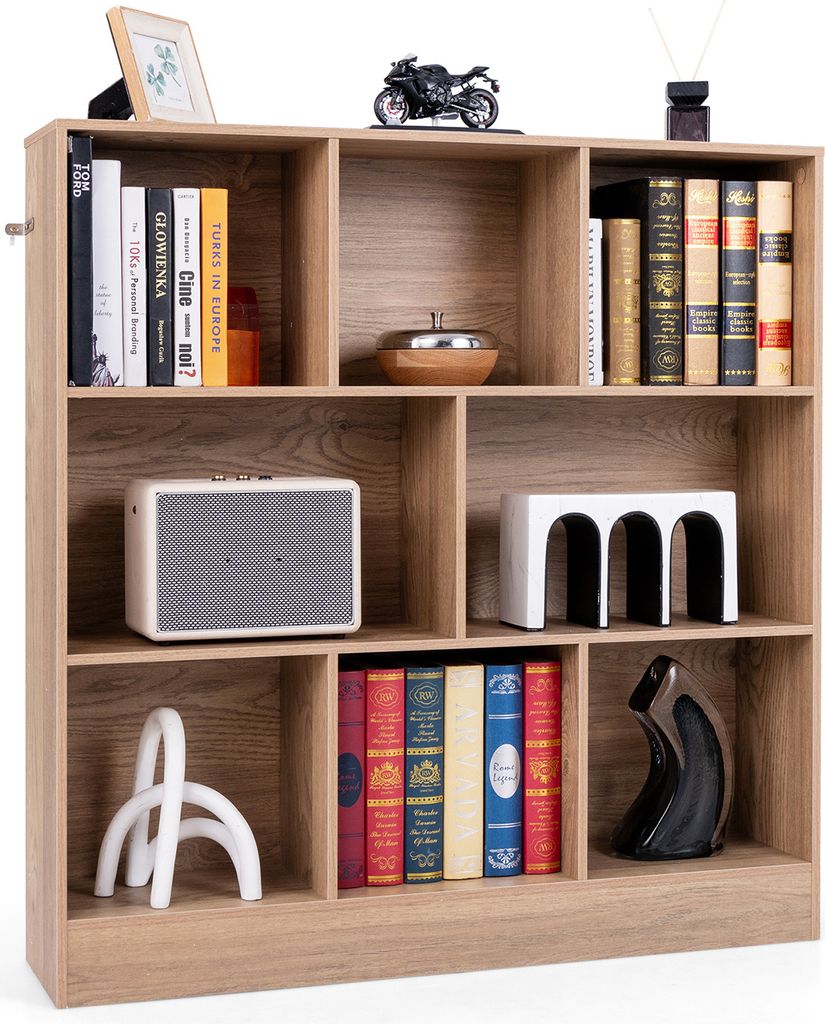 A wooden bookshelf filled with books and decorative items.